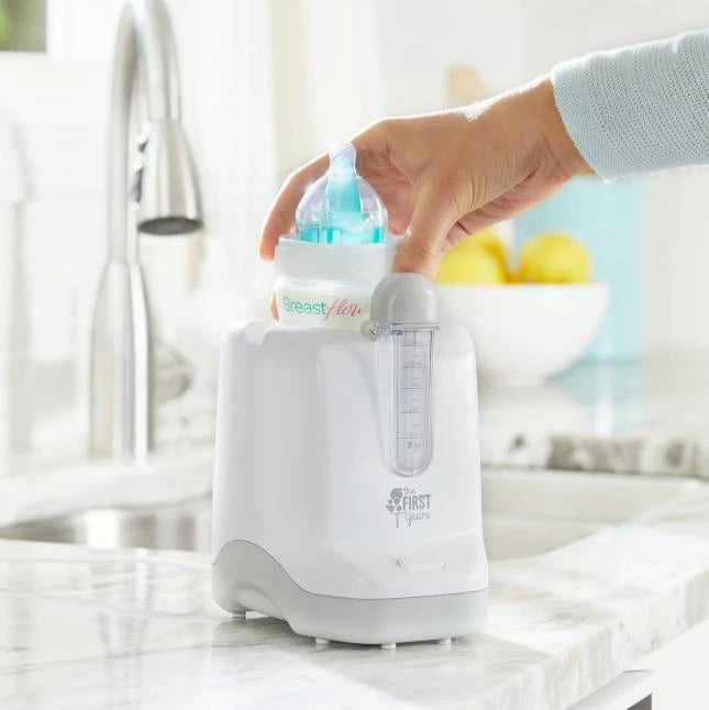 The First Years 2-in-1 Simple Serve Bottle Warmer - - Fat Brain Toys - US 3949